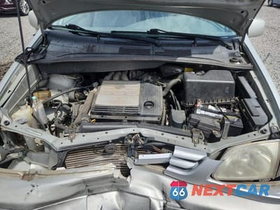 Zdjęcie 12 z 13 samochodu: 2003 TOYOTA SIENNA LE VIN:4T3ZF13C23U553010 - miniatura