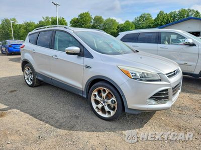 Czwarte zdjęcie samochodu z boku: 2016 FORD ESCAPE TITANIUM VIN:1FMCU9J98GUB90633 - miniatura