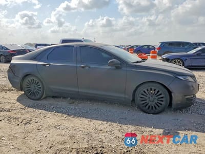 Czwarte zdjęcie samochodu z boku: 2015 LINCOLN MKZ VIN:3LN6L2G93FR612926 - miniatura