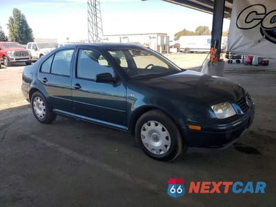 Czwarte zdjęcie samochodu z boku: 2001 VOLKSWAGEN JETTA GLS VIN:3VWSK69M21M183991 - miniatura
