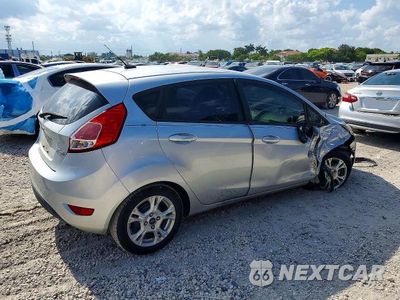 Trzecie zdjęcie samochodu z tyłu: 2015 FORD FIESTA SE VIN:3FADP4EJ9FM204149 - miniatura
