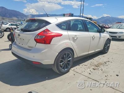 Trzecie zdjęcie samochodu z tyłu: 2014 FORD FOCUS TITANIUM VIN:1FADP3N28EL149535 - miniatura