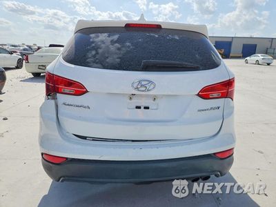 Zdjęcie 6 z 13 samochodu: 2014 HYUNDAI SANTA FE SPORT 2.0T VIN:5XYZU3LA8EG228301 - miniatura