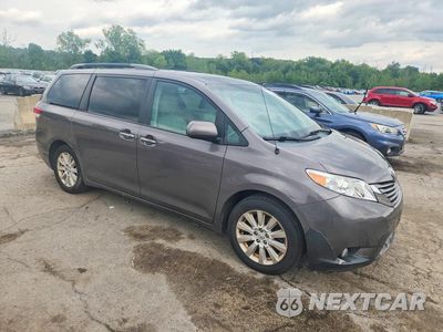 Czwarte zdjęcie samochodu z boku: 2014 TOYOTA SIENNA XLE 7-PASSENGER VIN:5TDDK3DC4ES088282 - miniatura