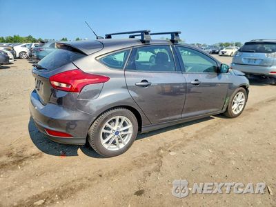 Trzecie zdjęcie samochodu z tyłu: 2017 FORD FOCUS SE VIN:1FADP3K20HL346403 - miniatura