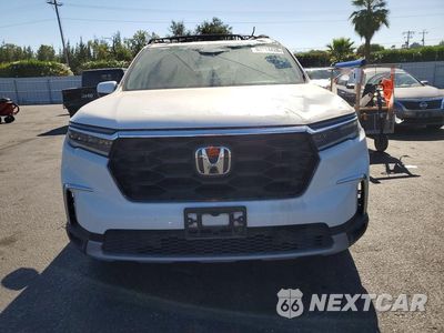 Piąte zdjęcie samochodu w środku: 2025 HONDA PILOT TOURING VIN:5FNYG2H79SB000255 - miniatura