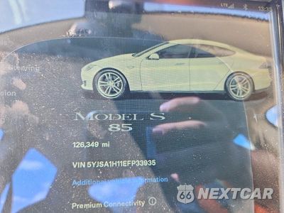 Zdjęcie 9 z 13 samochodu: 2014 TESLA MODEL S VIN:5YJSA1H11EFP33935 - miniatura