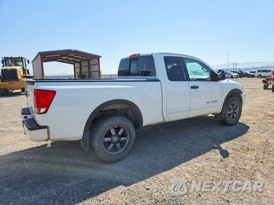 Trzecie zdjęcie samochodu z tyłu: 2010 NISSAN TITAN SV VIN:1N6AA0CC5EN501917 - miniatura