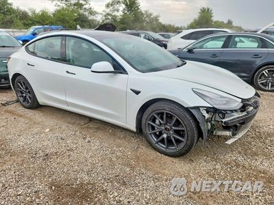 Czwarte zdjęcie samochodu z boku: 2022 TESLA MODEL 3 VIN:5YJ3E1EB0NF245887 - miniatura