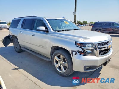 Czwarte zdjęcie samochodu z boku: 2016 CHEVROLET SUBURBAN K1500 LT VIN:1GNSKHKC6GR185578 - miniatura