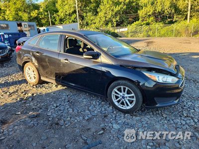 Czwarte zdjęcie samochodu z boku: 2017 FORD FOCUS SE VIN:1FADP3F28HL242512 - miniatura