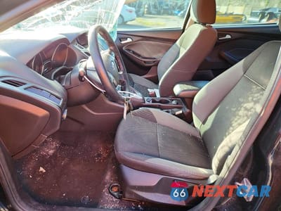 Zdjęcie 7 z 12 samochodu: 2014 FORD FOCUS SE VIN:1FADP3F24EL460040 - miniatura