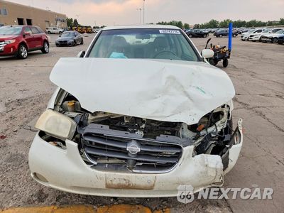 Piąte zdjęcie samochodu w środku: 2000 NISSAN MAXIMA GXE VIN:JN1CA31DXYT746451 - miniatura