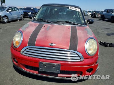 Piąte zdjęcie samochodu w środku: 2009 MINI COOPER VIN:WMWMF33569TW79337 - miniatura