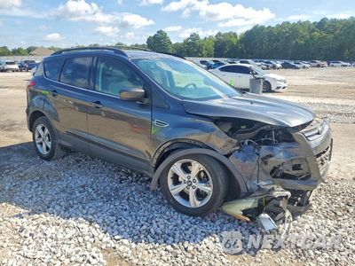 Czwarte zdjęcie samochodu z boku: 2015 FORD ESCAPE SE VIN:1FMCU0GX8FUB88509 - miniatura
