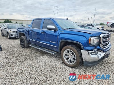 Czwarte zdjęcie samochodu z boku: 2018 GMC SIERRA K1500 SLT VIN:3GTU2NEC0JG127601 - miniatura