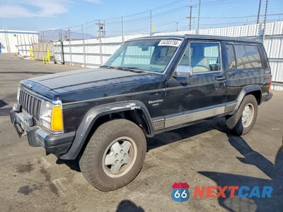 1990 JEEP CHEROKEE LAREDO 1J4FJ57L0LL286627 - główne zdjęcie licytacji z USA - miniatura