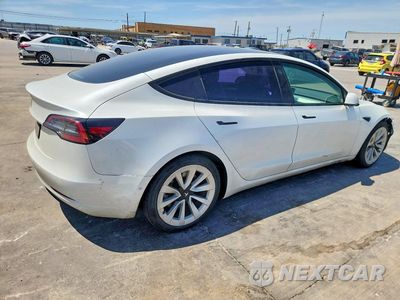 Trzecie zdjęcie samochodu z tyłu: 2022 TESLA MODEL 3 VIN:5YJ3E1EA2NF155745 - miniatura