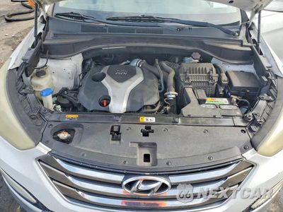 Zdjęcie 12 z 13 samochodu: 2013 HYUNDAI SANTA FE SPORT 2.0T VIN:5XYZU3LA3DG086938 - miniatura