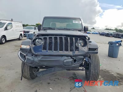 Piąte zdjęcie samochodu w środku: 2023 JEEP GLADIATOR SPORT VIN:1C6JJTAG0PL575147 - miniatura