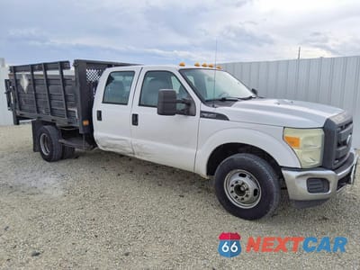 Czwarte zdjęcie samochodu z boku: 2015 FORD F350 SUPER DUTY VIN:1FD8W3G67FEB15022 - miniatura