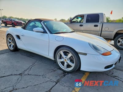 Czwarte zdjęcie samochodu z boku: 1999 PORSCHE BOXSTER VIN:WP0CA2986XU620076 - miniatura