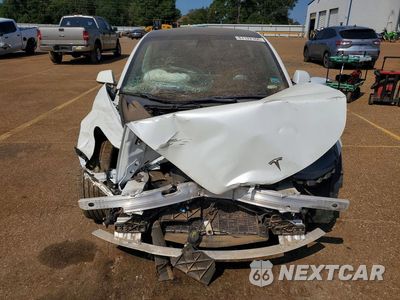 Piąte zdjęcie samochodu w środku: 2021 TESLA MODEL 3 VIN:5YJ3E1EB0MF980030 - miniatura