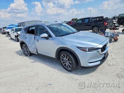 Czwarte zdjęcie samochodu z boku: 2021 MAZDA CX-5 GRAND TOURING VIN:JM3KFADM6M1318030 - miniatura