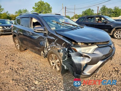 Czwarte zdjęcie samochodu z boku: 2016 TOYOTA RAV4 XLE VIN:JTMWFREV7GD085729 - miniatura