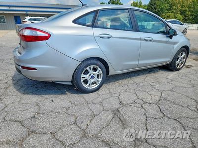 Trzecie zdjęcie samochodu z tyłu: 2015 FORD FIESTA SE VIN:3FADP4BJ6FM161121 - miniatura