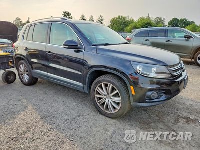 Czwarte zdjęcie samochodu z boku: 2012 VOLKSWAGEN TIGUAN S VIN:WVGBV7AXXCW544081 - miniatura