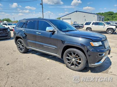 Czwarte zdjęcie samochodu z boku: 2014 JEEP GRAND CHEROKEE SUMMIT VIN:1C4RJFJG2EC531614 - miniatura
