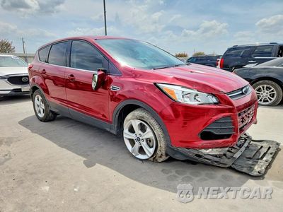 Czwarte zdjęcie samochodu z boku: 2014 FORD ESCAPE SE VIN:1FMCU9G92EUB40783 - miniatura