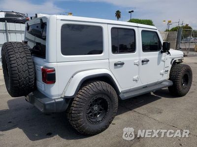 Trzecie zdjęcie samochodu z tyłu: 2018 JEEP WRANGLER UNLIMITED SAHARA VIN:1C4HJXEGXJW319113 - miniatura
