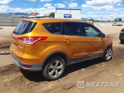 Trzecie zdjęcie samochodu z tyłu: 2016 FORD ESCAPE SE VIN:1FMCU0GX4GUC79617 - miniatura