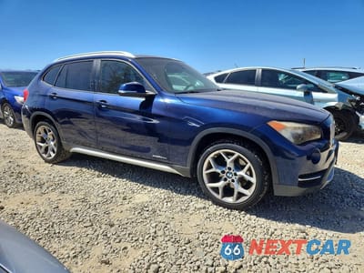 Czwarte zdjęcie samochodu z boku: 2013 BMW X1 XDRIVE28I VIN:WBAVL1C55DVR84231 - miniatura