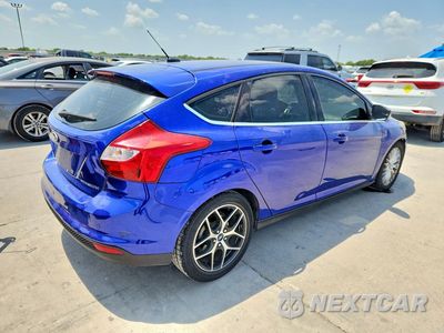 Trzecie zdjęcie samochodu z tyłu: 2014 FORD FOCUS TITANIUM VIN:1FADP3N26EL176832 - miniatura