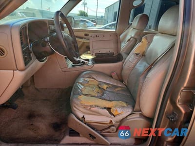 Zdjęcie 7 z 13 samochodu: 2003 GMC YUKON XL C1500 VIN:1GKEC16Z73R219311 - miniatura