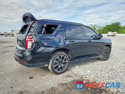 Trzecie zdjęcie samochodu z tyłu: 2023 CHEVROLET TAHOE C1500 RST VIN:1GNSCRKD9PR117934 - miniatura