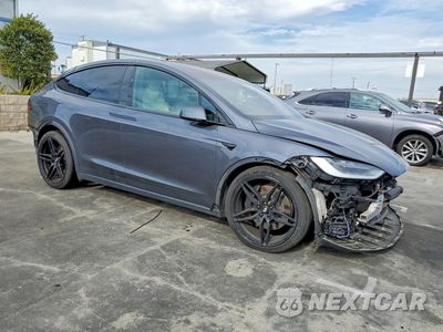Czwarte zdjęcie samochodu z boku: 2022 TESLA MODEL X VIN:7SAXCDE51NF351237 - miniatura