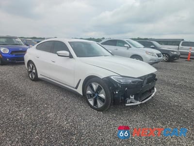 Czwarte zdjęcie samochodu z boku: 2024 BMW I4 EDRIVE 35 VIN:WBY43AW0XRFR72851 - miniatura