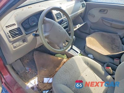 Zdjęcie 8 z 12 samochodu: 2003 KIA RIO BASE VIN:KNADC125736211458 - miniatura