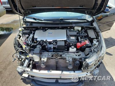 Zdjęcie 11 z 13 samochodu: 2021 TOYOTA PRIUS PRIME LE VIN:JTDKAMFPXM3182697 - miniatura