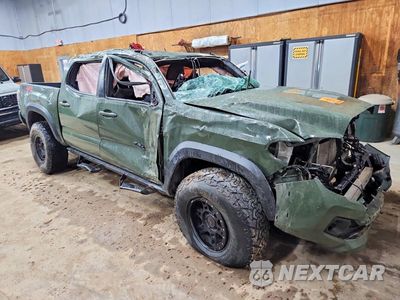 Czwarte zdjęcie samochodu z boku: 2022 TOYOTA TACOMA TRD OFF-ROAD VIN:3TMCZ5AN1NM472836 - miniatura