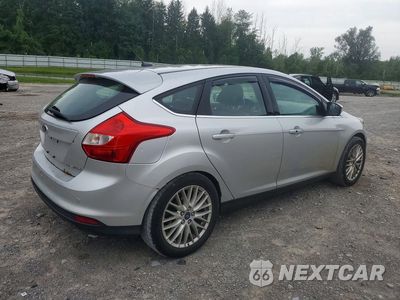 Trzecie zdjęcie samochodu z tyłu: 2014 FORD FOCUS TITANIUM VIN:1FADP3N21EL245085 - miniatura
