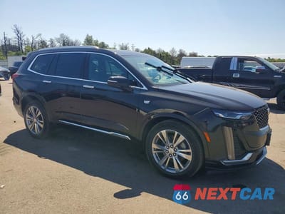 Czwarte zdjęcie samochodu z boku: 2023 CADILLAC XT6 PREMIUM LUXURY VIN:1GYKPDRS6PZ183422 - miniatura