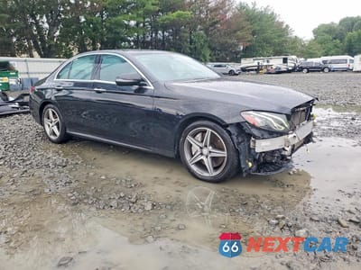 Czwarte zdjęcie samochodu z boku: 2017 MERCEDES-BENZ E 300 4MATIC VIN:WDDZF4KB7HA063412 - miniatura