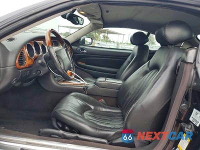 Zdjęcie 7 z 12 samochodu: 2005 JAGUAR XK8 VIN:SAJDA42C352A41560 - miniatura