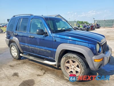 Czwarte zdjęcie samochodu z boku: 2004 JEEP LIBERTY SPORT VIN:1J4GL48KX4W122235 - miniatura