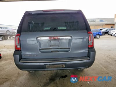 Zdjęcie 6 z 12 samochodu: 2019 GMC YUKON XL DENALI VIN:1GKS2HKJ4KR263988 - miniatura